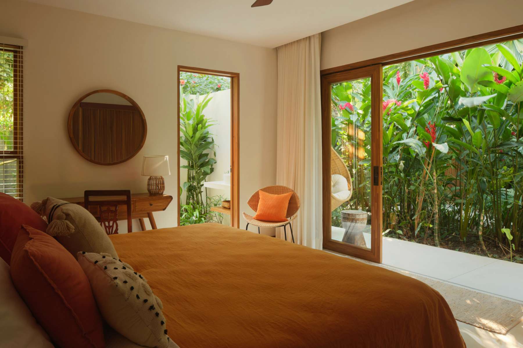 Bedroom opening onto the tropical garden
